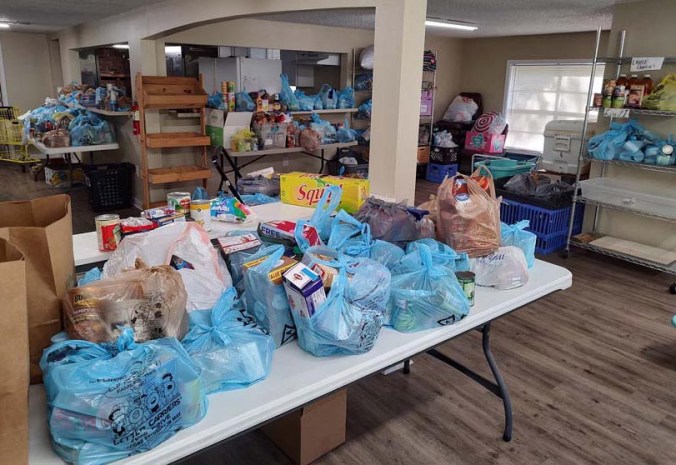 Food Drive Stack Food drive stocks pantry shelves | Holt Enterprise News